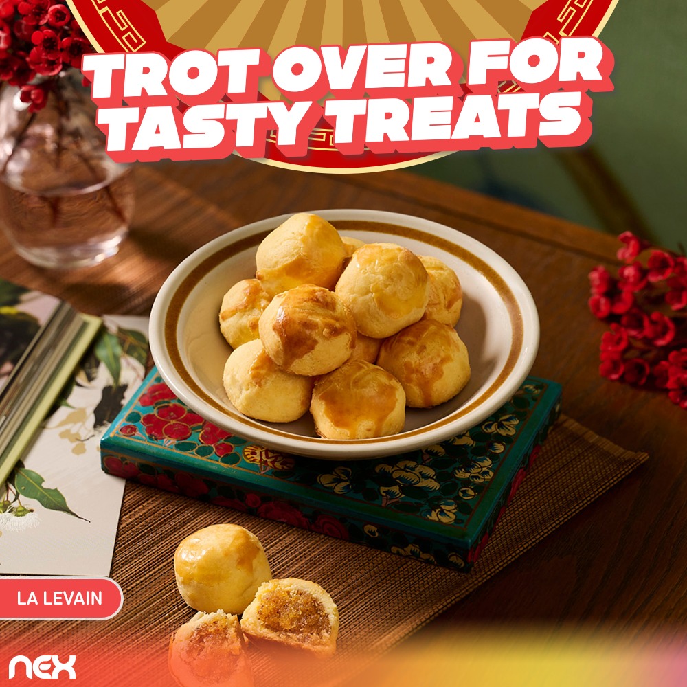 Shoppers browsing the festive stalls at the NEX Atrium