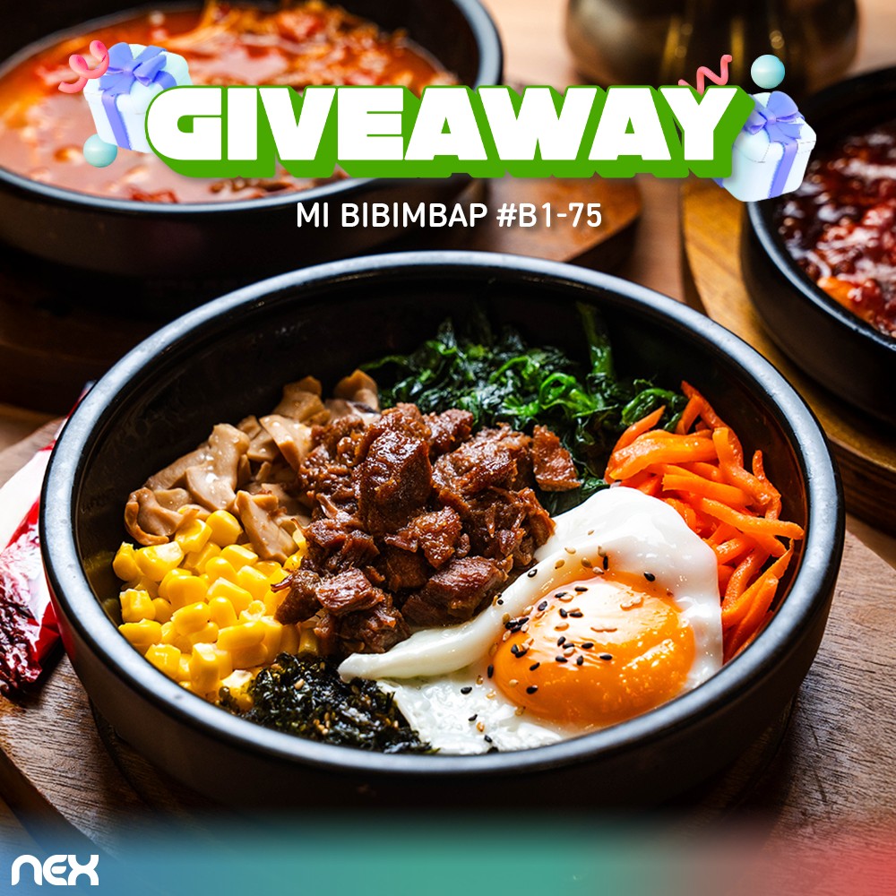 A delicious bowl of Korean bibimbap with fresh vegetables and toppings