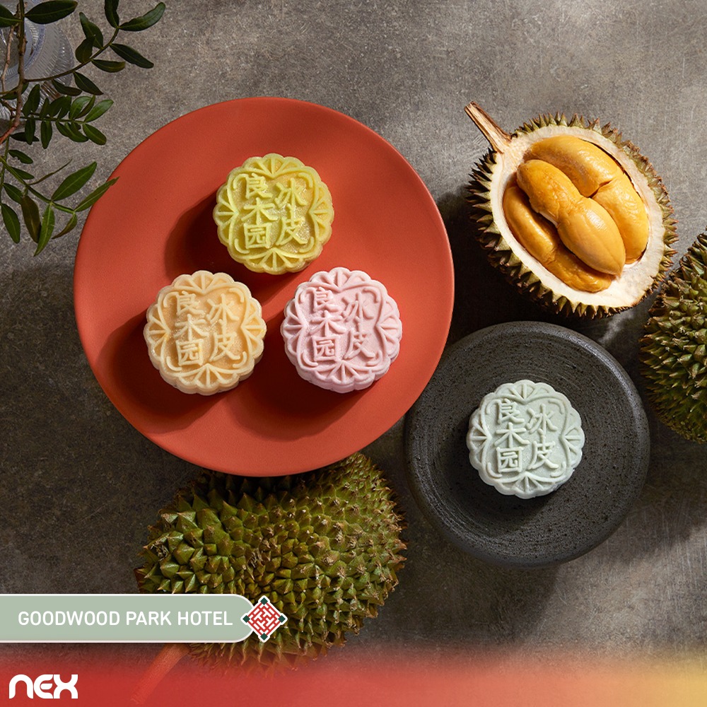 A vibrant display of mooncakes in various flavors and designs.