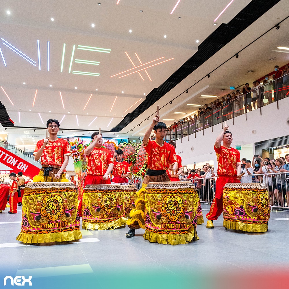 Majestic dragon soaring through the festive crowd